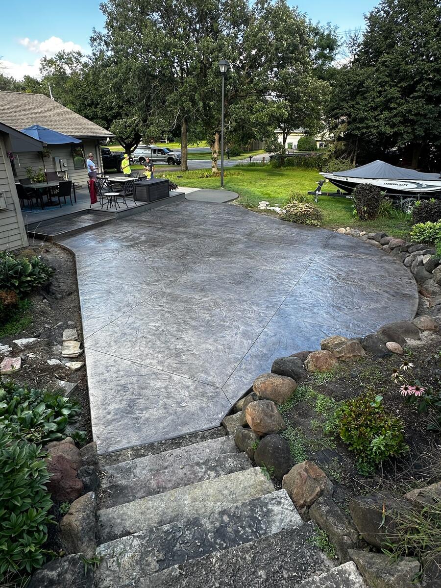 Stamped concrete patio with multi-color antiquing finish