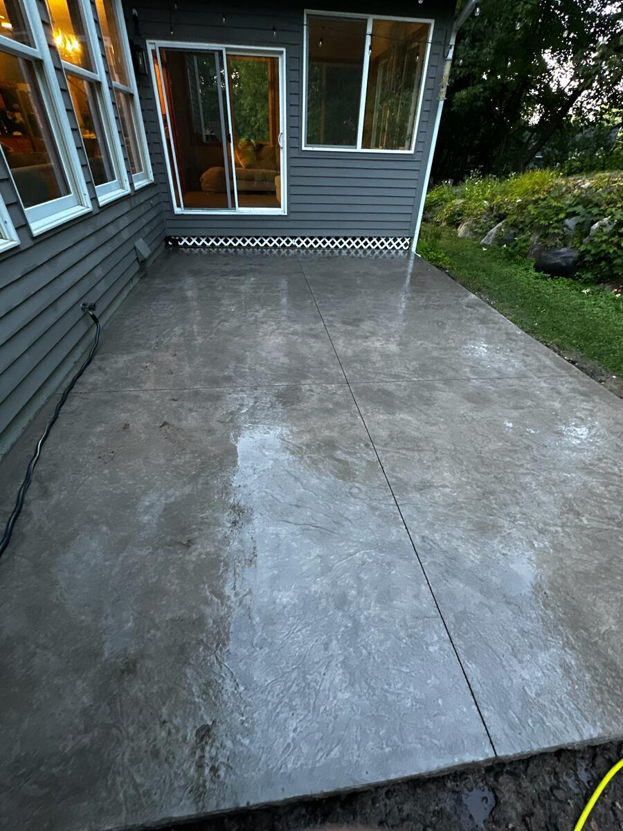 Stamped concrete walkway with natural stone texture in Minnesota