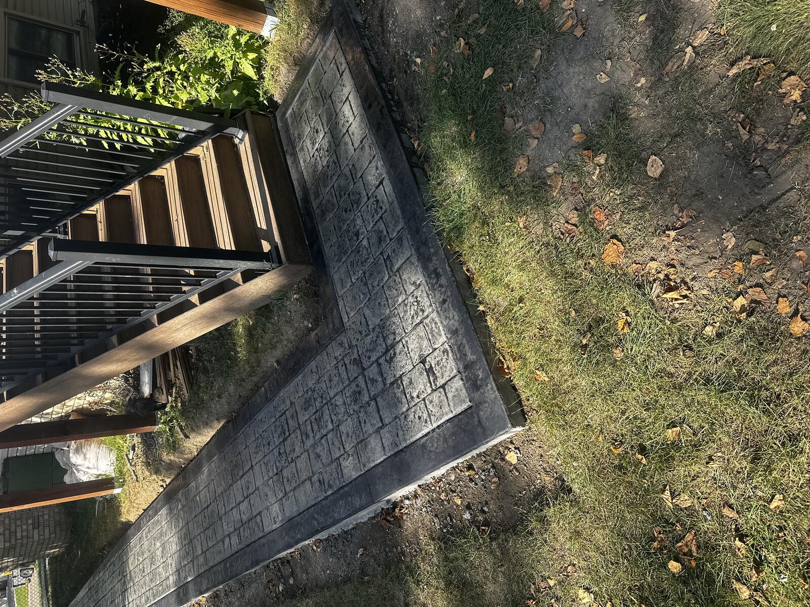 Large stamped concrete patio with seamless texture in Minnesota